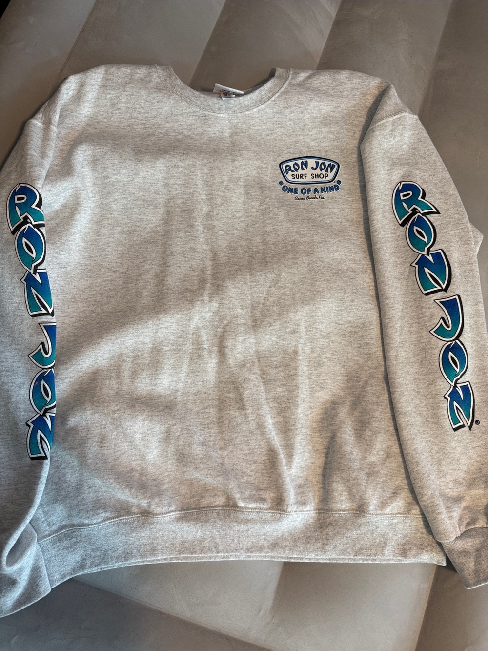 Women’s Ron Jon Gray Crewneck Sweatshirt with Blue Sleeve Graphics
